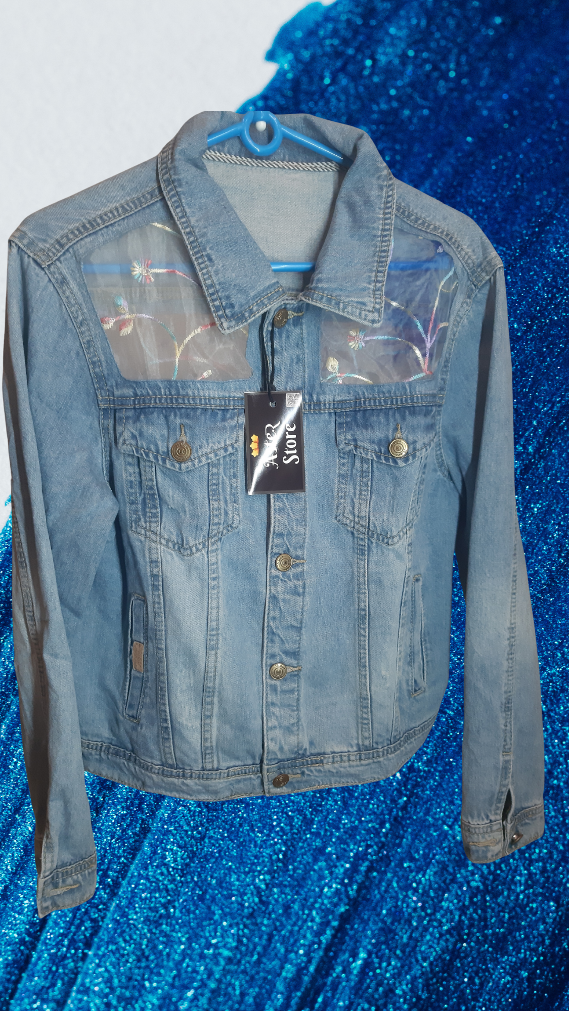 💠🌸Serene Bloom – Light Blue Denim Jacket with Colorful Floral & Leaf Embroidery on Net Fabric