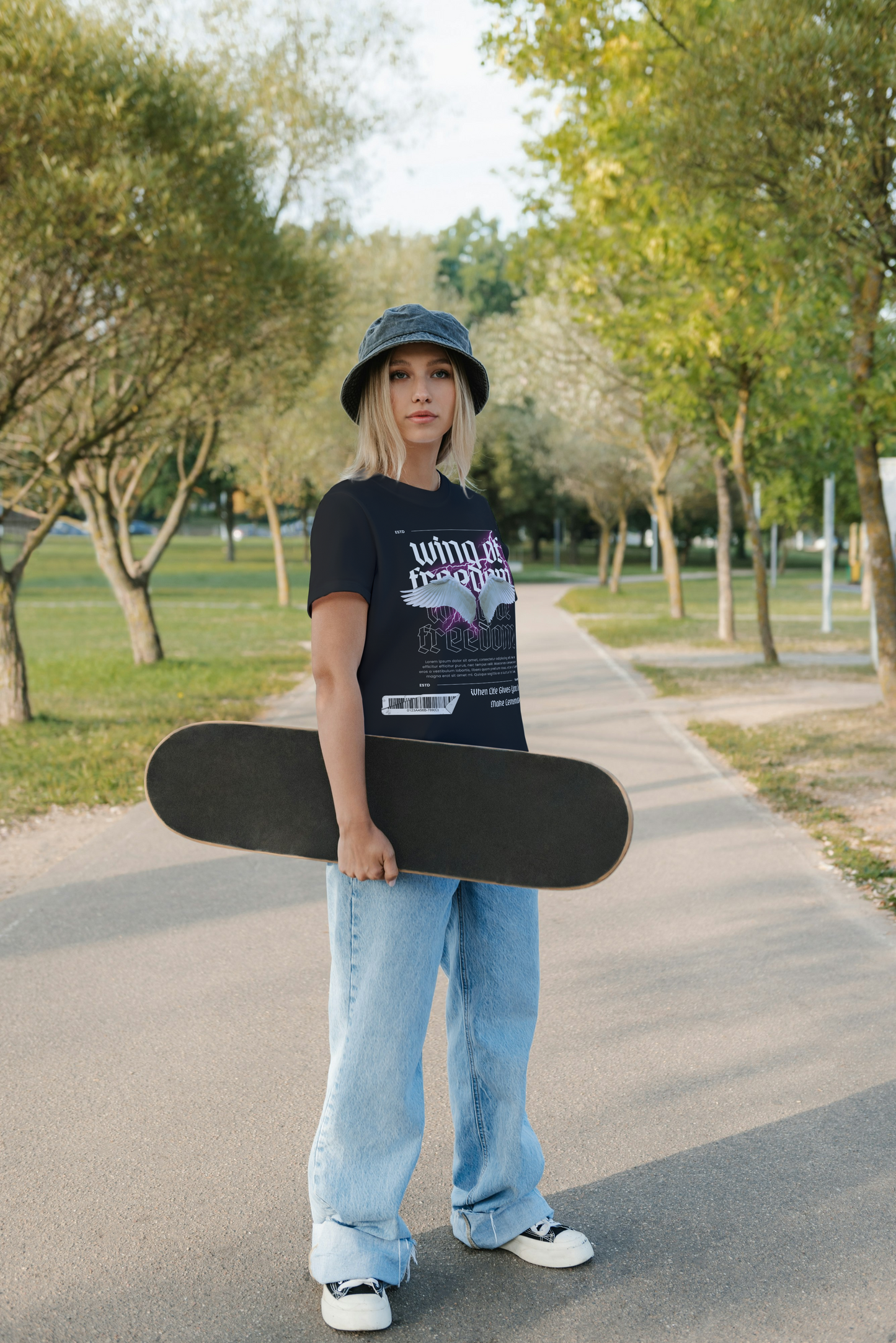 "Wing of Freedom Graphic Loose-Fit T-Shirt – ASTER STORE Exclusive"